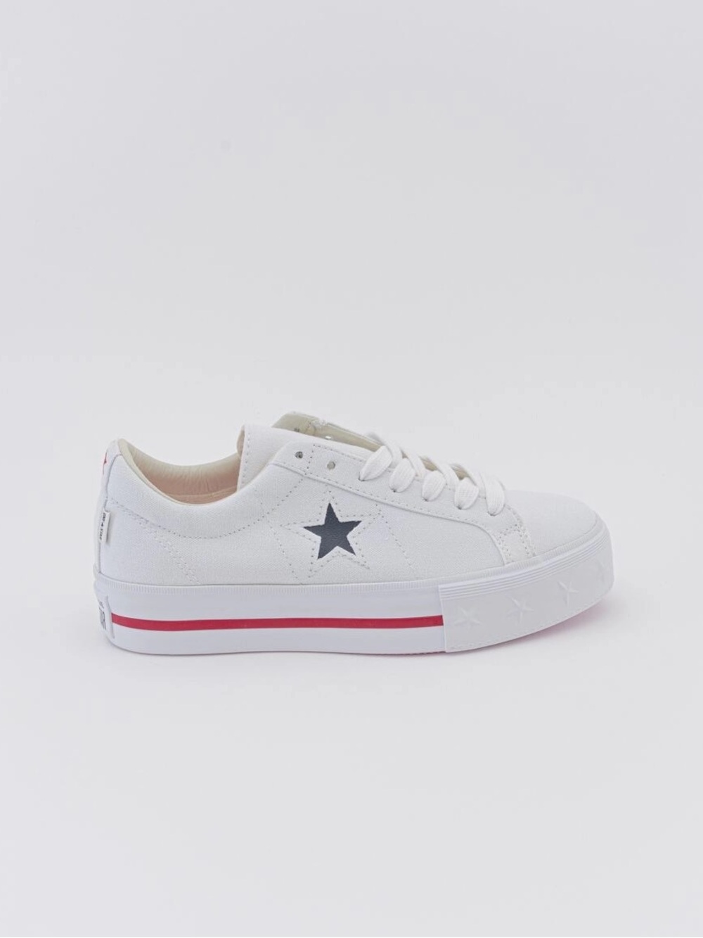 White canvas Converse One Star sneakers